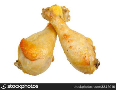 roasted chicken drumsticks isolated on a white background