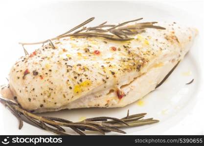 roasted chicken fillet on a white plate