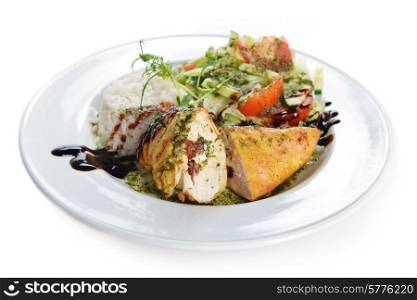 roasted chicken, rice and vegetables on dish