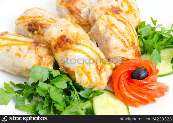 roasted chicken rolls served with fresh vegetables