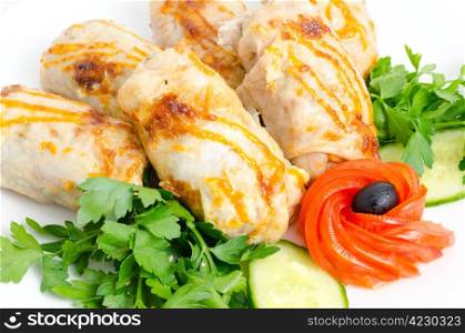 roasted chicken rolls served with fresh vegetables