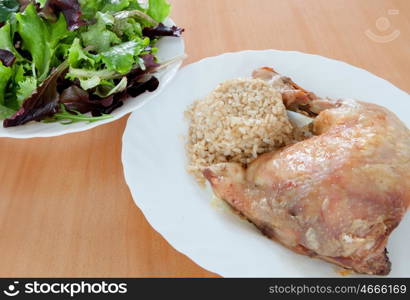 Roasted chicken with rice and salad. Healthy food