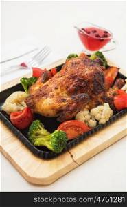 Roasted chicken with vegetables.. Roasted chicken with vegetables. Thanksgiving or christmas theme.