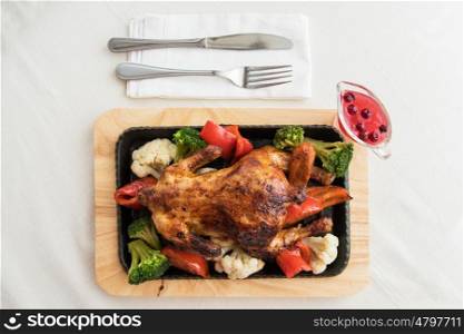 Roasted chicken with vegetables.. Roasted chicken with vegetables. Thanksgiving or christmas theme.