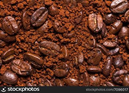 roasted coffee beans and powder background