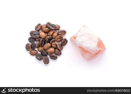 Roasted coffee beans and rahat lokum isolated over white background