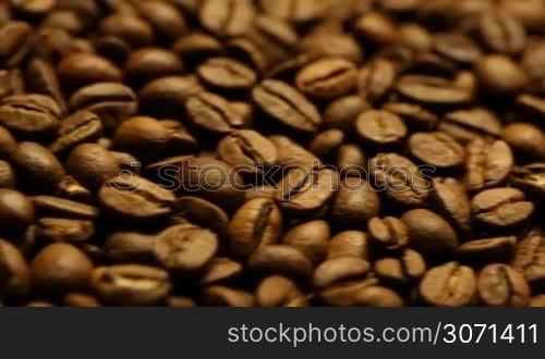 Roasted coffee beans background macro