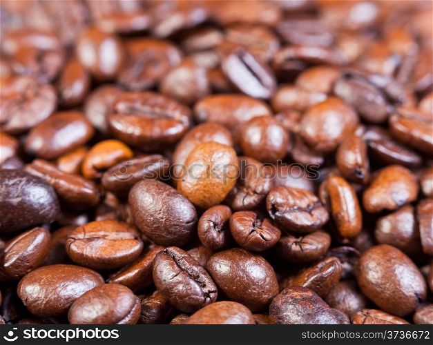 roasted coffee beans close up on able