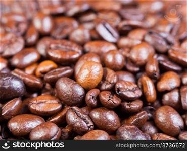 roasted coffee beans close up on able