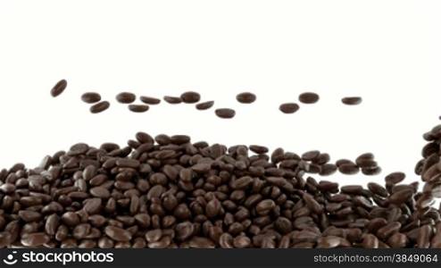 Roasted Coffee beans falling and mixing with slow motion. Alpha is included