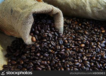 Roasted coffee beans in jute sack