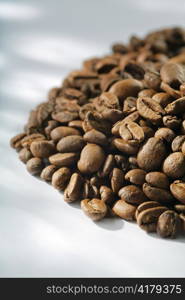 Roasted coffee beans. Shallow depth-of-field.