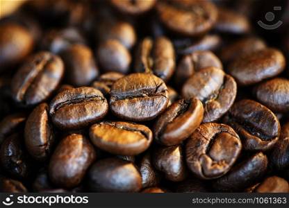 Roasted coffee beans texture background / Closeup macro group of coffee beans