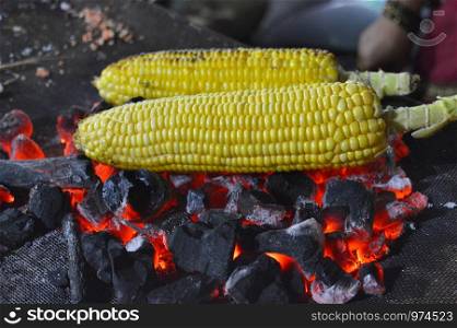 Roasted corns on coal fire, Pune, Maharashtra, India