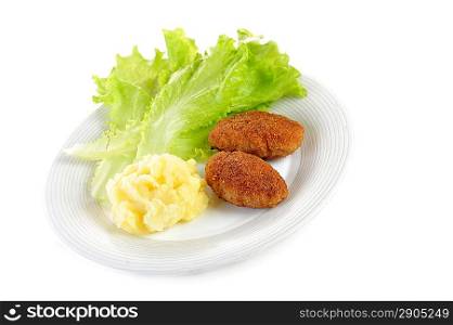 roasted cutlets of pork with potato and lettuce