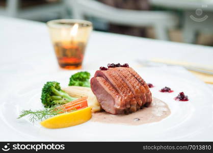 Roasted duck breast with cranberry cream sauce