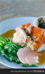 Roasted duck over steamed rice , Chinese style cuisine