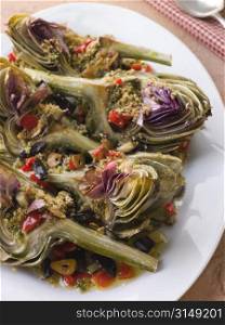 Roasted Globe Artichokes with Aubergine Peppers and Olives