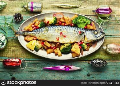 Roasted mackerel fish with pineapple for Christmas table.. Grilled fish with pineapple for Christmas