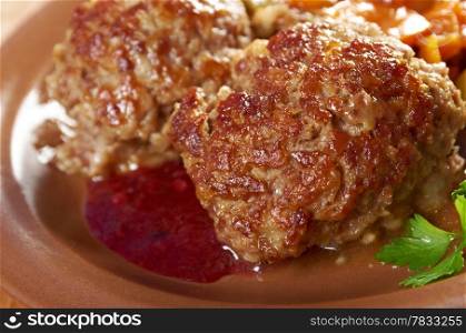 roasted meatballs beef with vegetables on a plate