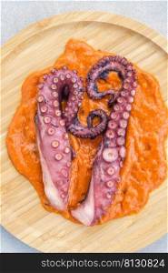 Roasted octopus tentacles with chilli romesco sauce