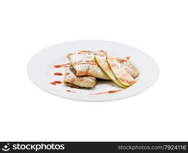 Roasted pancakes with banana on an isolated background. Roasted pancakes with pears