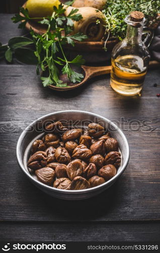 Roasted peeled chestnuts in bowl for tasty seasonal cooking