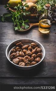 Roasted peeled chestnuts in bowl for tasty seasonal cooking