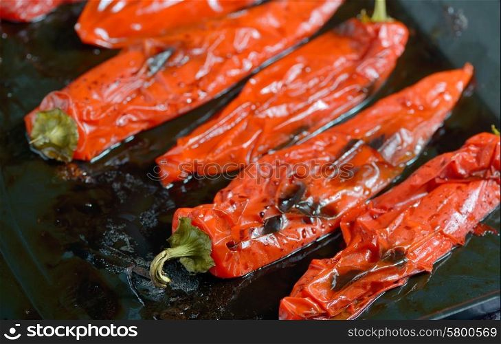 roasted red peppers on steel tray