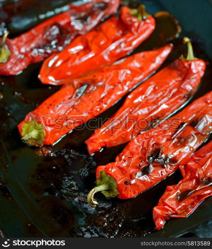 roasted red peppers on steel tray