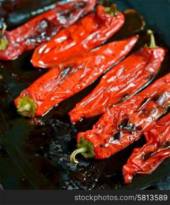 roasted red peppers on steel tray
