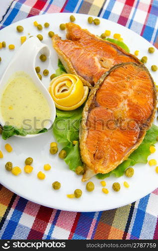 Roasted salmon in the plate