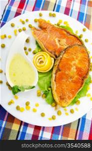 Roasted salmon in the plate
