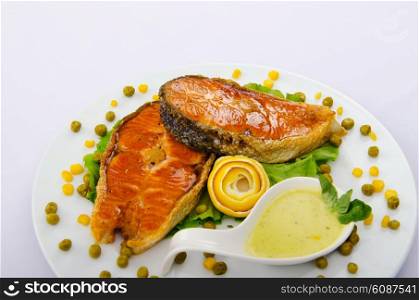 Roasted salmon in the plate
