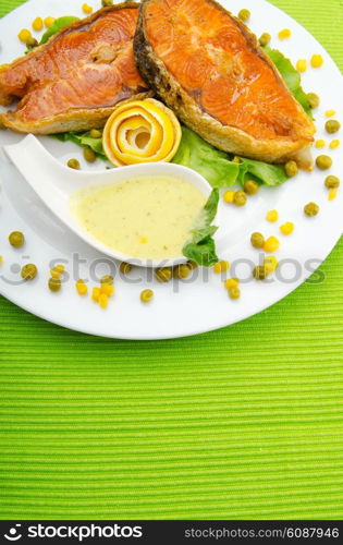 Roasted salmon in the plate