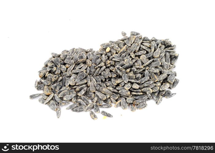 Roasted salted black sunflower seed isolated on white