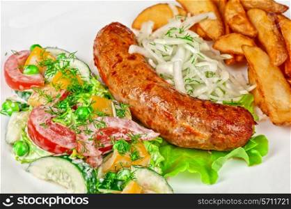 Roasted sausage with vegetables closeup