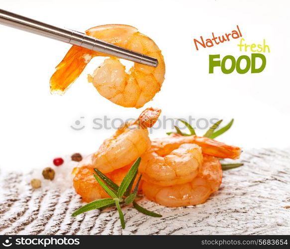 Roasted tails of shrimps with fresh rosemary