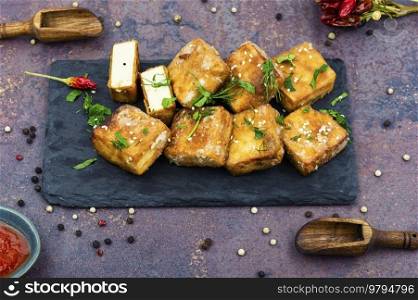 Roasted tofu cheese. Vegetarian food. Delicious tofu cheese