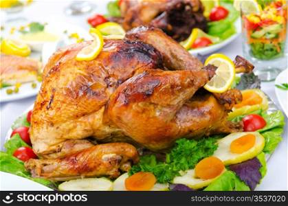 Roasted turkey on the festive table