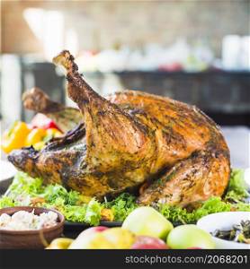 roasted turkey with food table