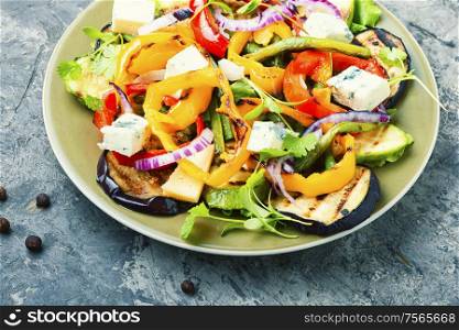 Roasted vegetables.Grilled pepper, eggplant and zucchini salad.Vegetable grilled salad.Healthy food. Grilled vegetables salad on plate