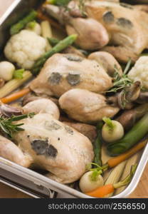 Roasting Tray of Black Truffled Poussins with Baby Spring Vegetables