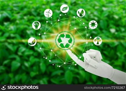 Robot hand with touching virtual environment icons over the network connection on nature background, Artificial Intelligence and Technology ecology concept