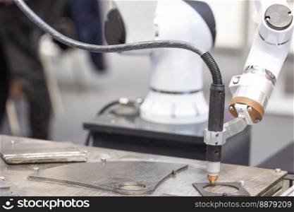Robot or robotic welding arm