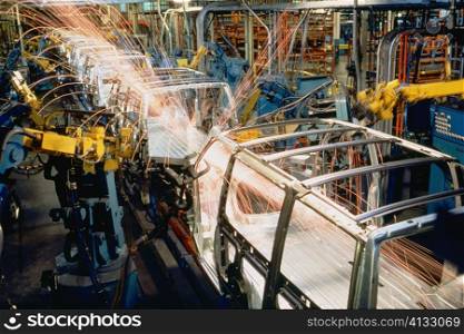 Robots weld van bodies at GM plant, Baltimore, Maryland