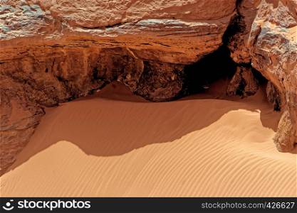 Rock and fine sand with ripple marks and wind ripples in the desert of Wadi Rum, Jordan, middle east
