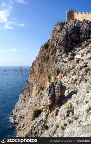 Rock and wall of castle in Alanya, Turkey