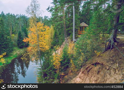 Rock at the river Salaca in Latvia. 2014 Sandstone cliffs on the river shore in the Gaujas National Park.