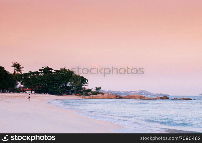 Rock cape summer white sand beach pink tone Sunset or sunrise sky in Samui - Thailand tropical isalnd beautiful nature scenery in evening or morning
